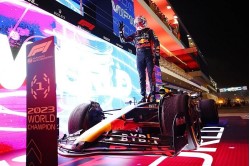 Red Bull RB19 #1 Sprint Race Qatar GP 2023 (Max Verstappen - 2023 Drivers' Champion) with pit board